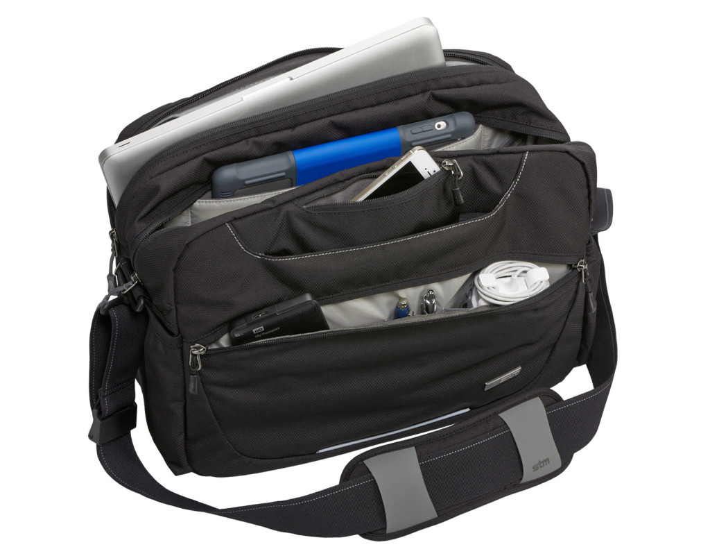 An STM laptop bag with a laptop inside.
