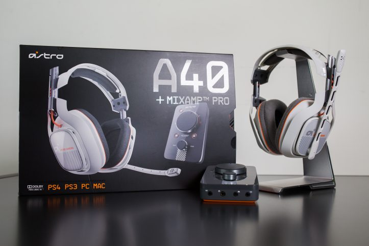 A pair of Astro headphones and a box on a table.