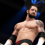 A WWE 2K16 wrestler with tattoos is standing in a wrestling ring.