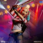 Harley Quinn action figure with a bat.