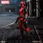 A Deadpool action figure wields a sword.