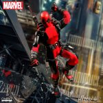 Deadpool action figure with a city background.