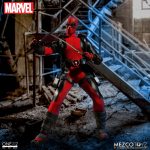 Deadpool is shown holding a sword.