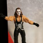 A Mattel wrestler with a mask on his face.