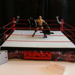 A Mattel wrestling ring with a figure in it.