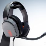 An ASTRO gaming headset with a microphone attached to it.