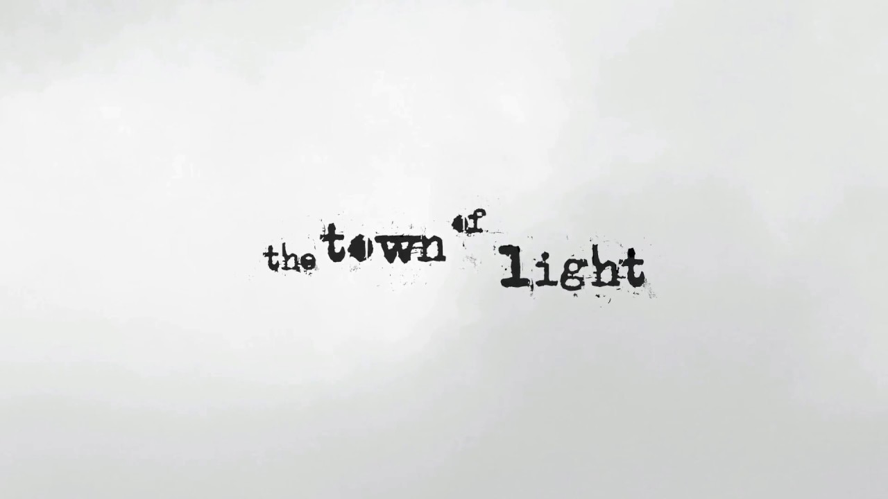 The "The Town of Light" cover art showcases the hauntingly beautiful visuals of the game, capturing its unique atmosphere and narrative.