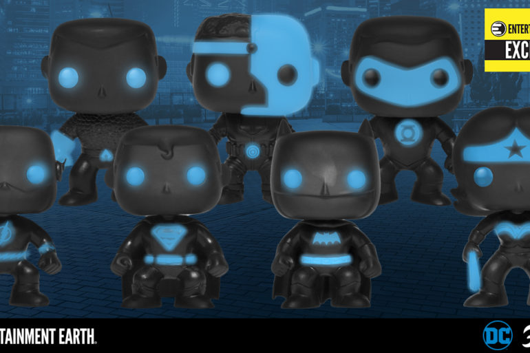 A group of Justice League Funko Pop figures in black and blue.