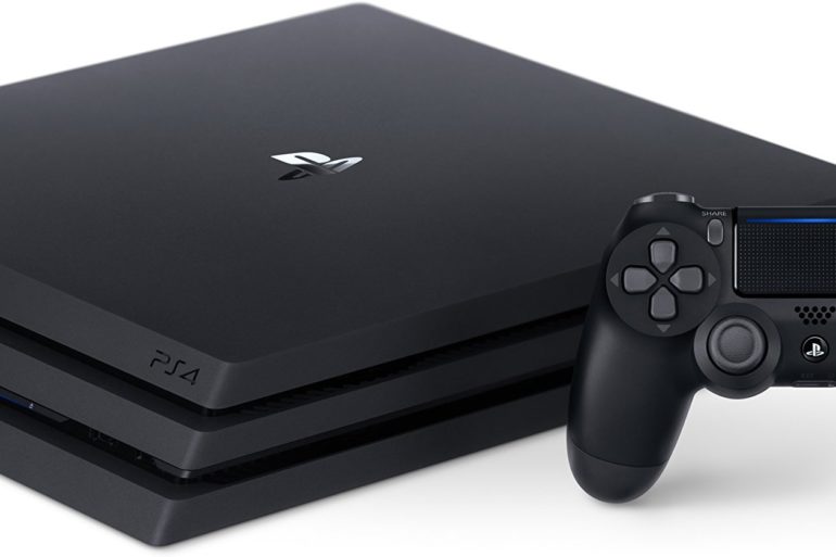 Holiday Gift Guide: A black PlayStation 4 console with two controllers, perfect for gifting this season.