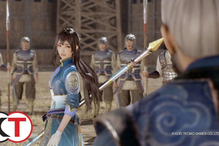 In the epic game Dynasty Warriors 9, a woman fearlessly wields a powerful sword, standing poised and ready in front of a formidable group of soldiers.