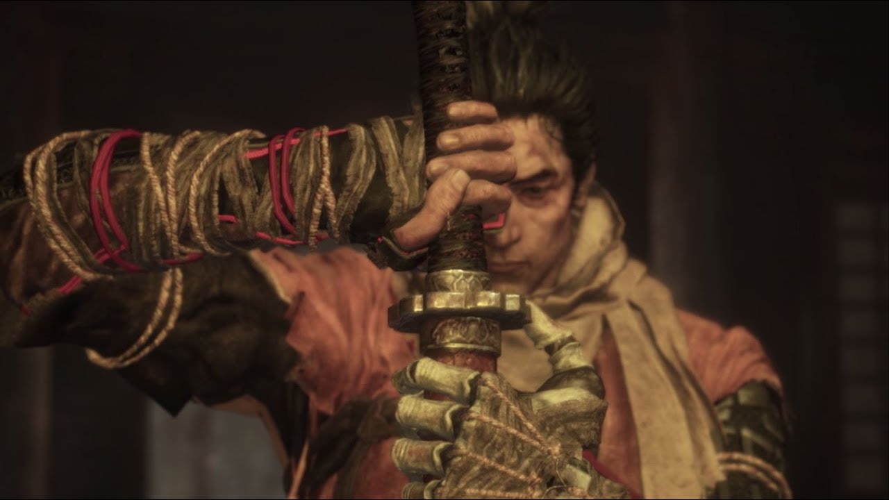 A man wielding a sword in the intense TGS Trailer for Sekiro: Shadows Die Twice video game.