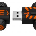 A black and orange USB drive with wheels perfect for GRIP Combat Racing enthusiasts who want to complete their Collector's Edition.