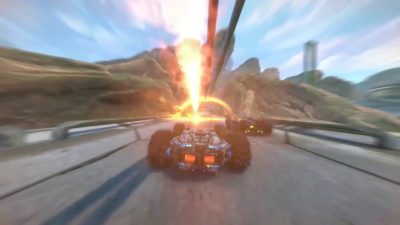 In a thrilling display of advanced GRIP technology, a high-speed car descends down a hill with flames emanating from its powerful engine. This intense spectacle combines the adrenaline-pumping elements of