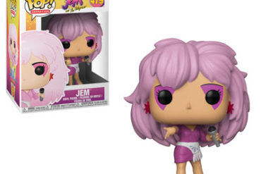 A Jem Funko Pop vinyl figure of a girl with pink hair.