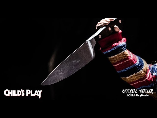 A person holding a knife in front of a black background in the 2019 movie "Child's Play," leaving a chilling first impression.