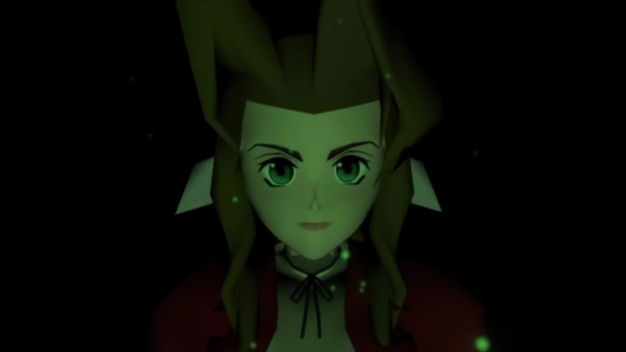 A girl with green eyes playing on Xbox One in the dark.