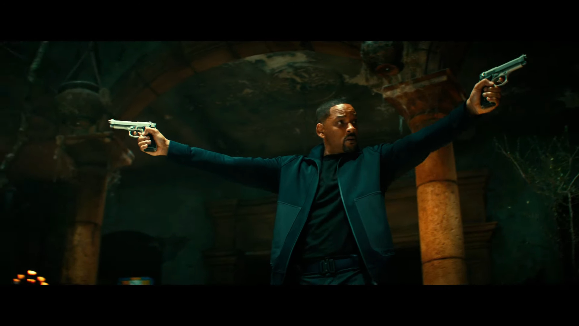 In the official trailer for "Bad Boys For Life," a man makes a powerful 1st impression as he stands in front of an ornate building, confidently holding two guns.