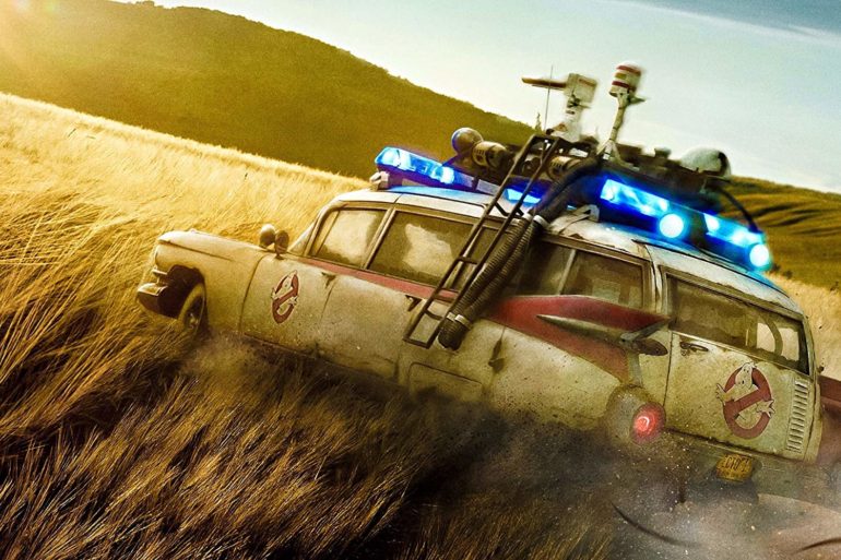 The official trailer for Ghostbusters: Afterlife showcases a Ghostbusters car driving through a chilling field.