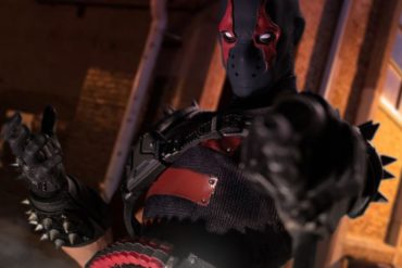 A Batman action figure with a mask on.