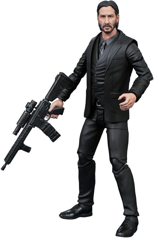 The NN2D Review of the John Wick: Chapter Two Action Figure by Diamond Select Toys, featuring an intricately designed man holding a gun.