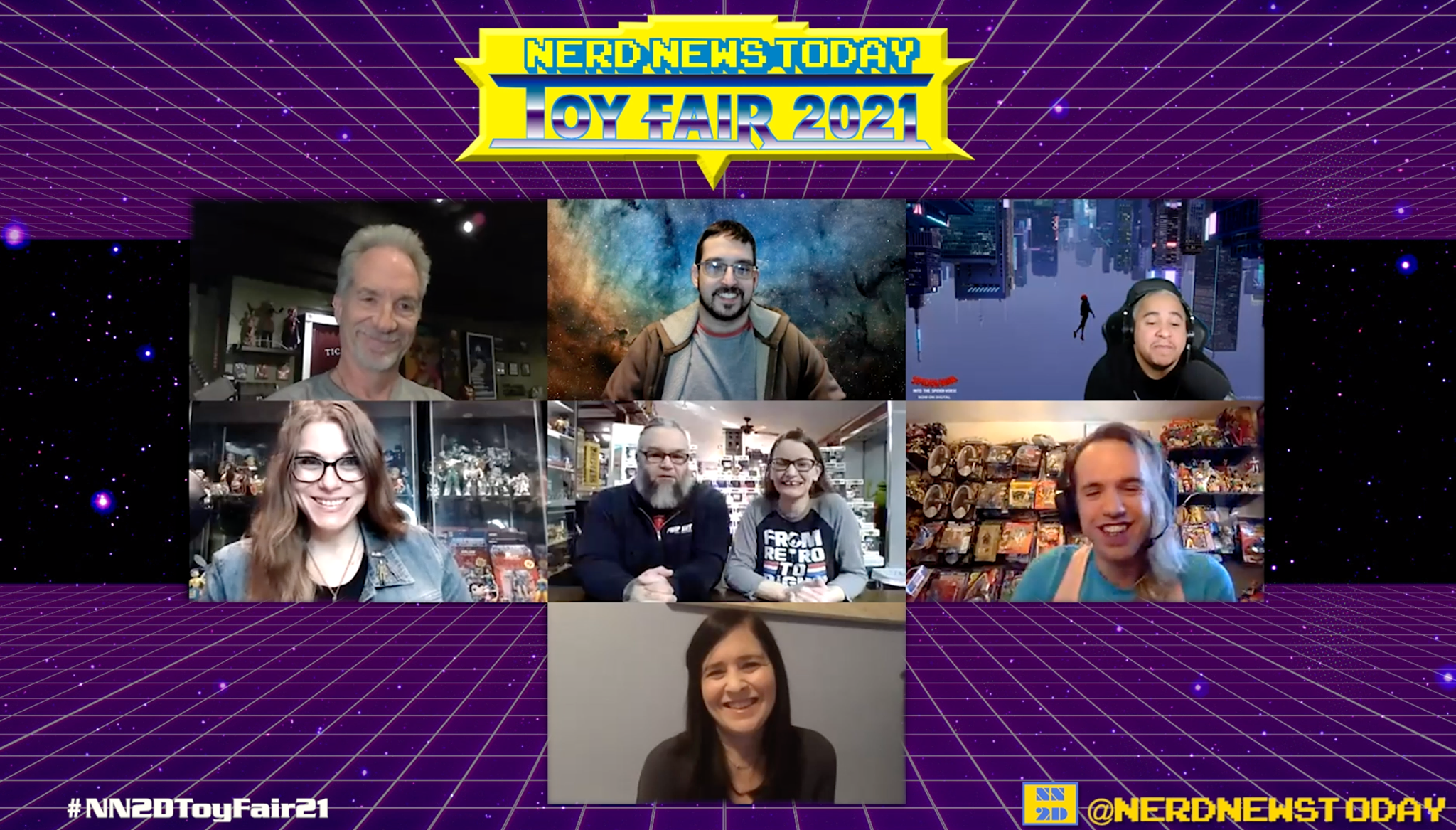 A group of people at the Toy Fair 2021 in front of a purple background.