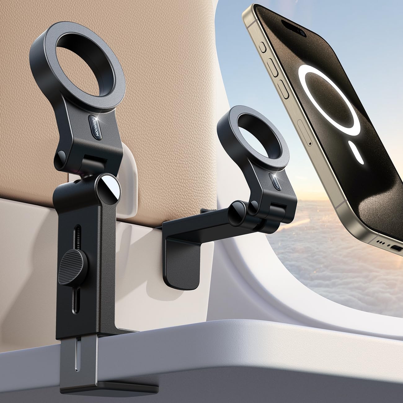 The adjustable RAGE Works phone holder attaches seamlessly to an airplane seat tray, cradling your smartphone by the window with clouds drifting by. Perfect for any 2024 Holiday Tech Gift Guide, this gadget ensures in-flight entertainment is always within easy reach.
